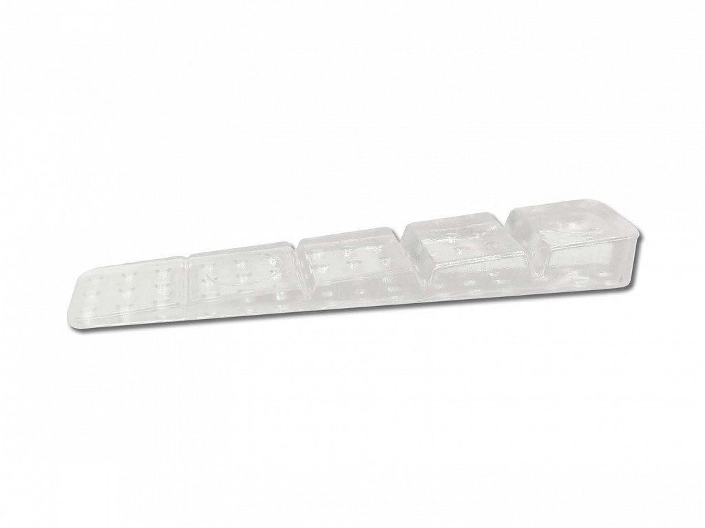Klínek podkládací lámací plastový, transparentní (b.100)